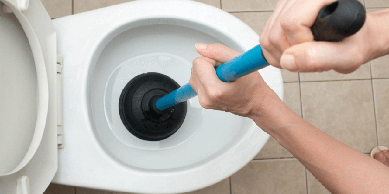 when to call a plumber for blocked toilet